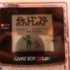 Photo d'une Game Boy Color Transparente/Violette, vue de l'écran qui fonctionne