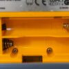 Photo d'une Game Boy Pocket Jaune, vue du compartiment à piles